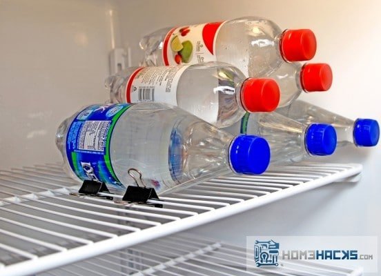 Effortlessly Organize Bottles with Binder Clips