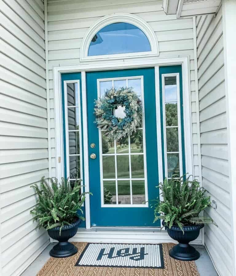 Blue Door with White Siding