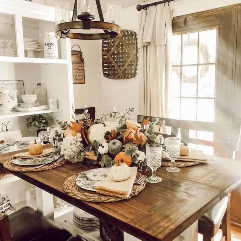 Farmhouse Table with Pumpkin Centerpiece