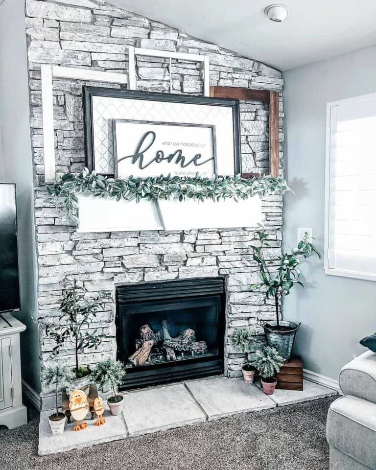 Gray Stone Fireplace with Greenery