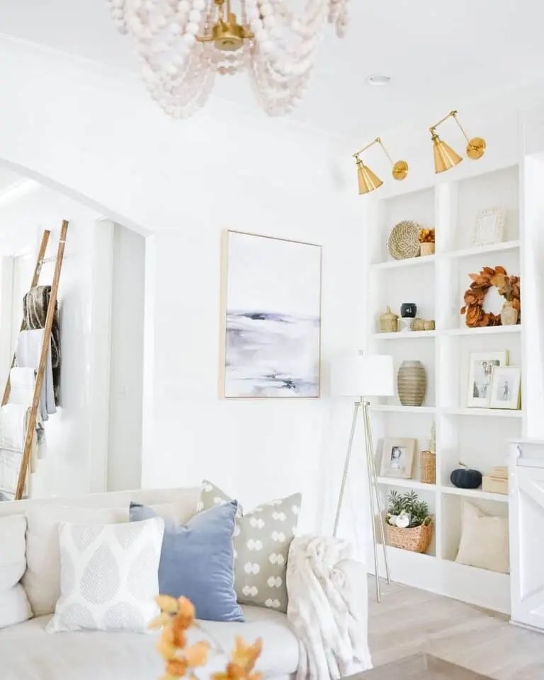 White Living Room with Orange Decor