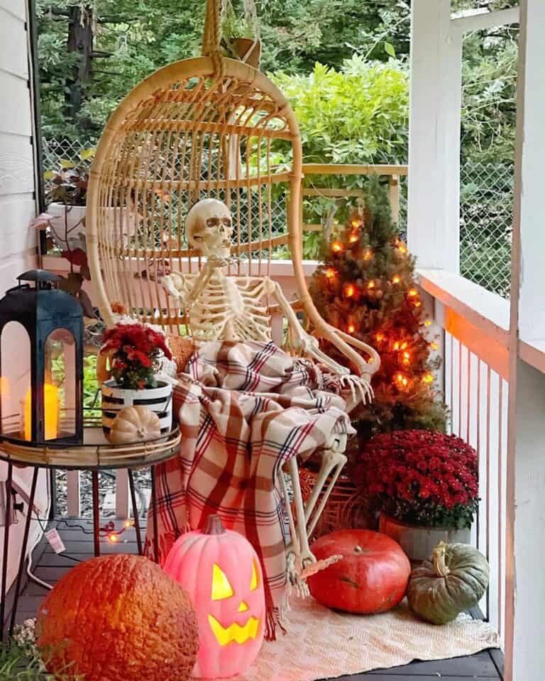 Porch Skeleton with Plaid Blanket